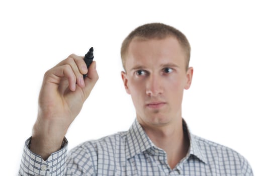 handsome young business man touching screen isolated photo
