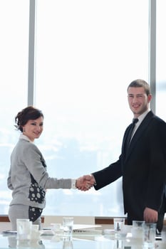 business man and woman handshake on  meeting photo