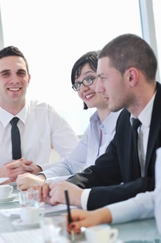 group of business people at meeting photo