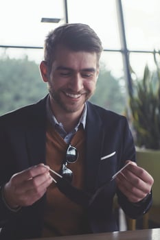 business man wearing protective face mask at luxury office photo