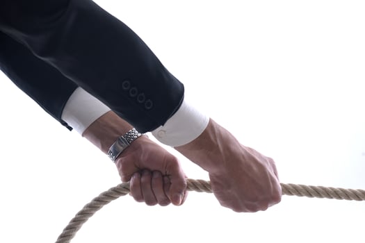 business man with rope isolated on white background photo