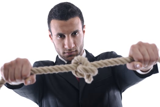 business man with rope isolated on white background photo