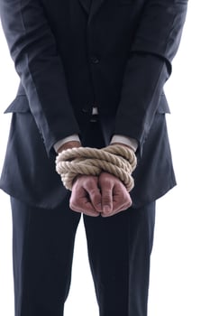 business man with rope isolated on white background photo