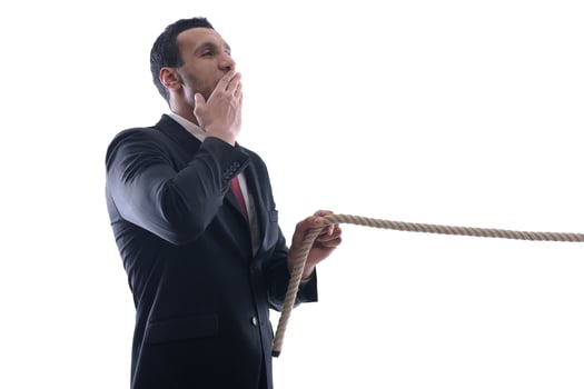 business man with rope isolated on white background photo