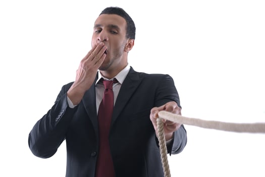 business man with rope isolated on white background photo