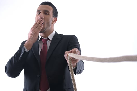 business man with rope isolated on white background photo