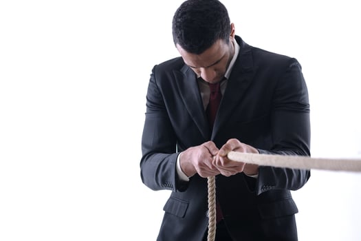 business man with rope isolated on white background photo