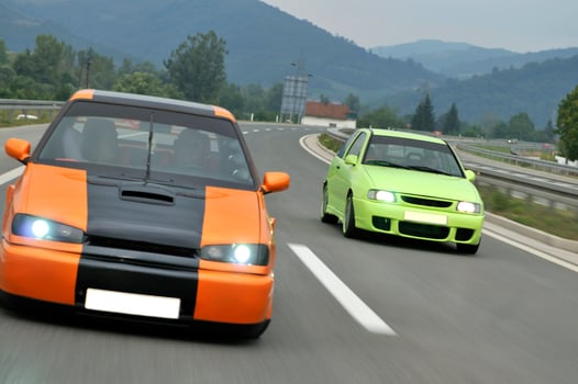 Tuning cars sacing down the highway photo
