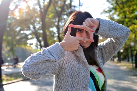 brunette Cute young woman  posing outdoors photo