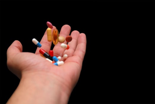 pills in hand photo