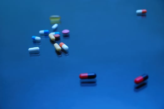 pills on glosy surface photo