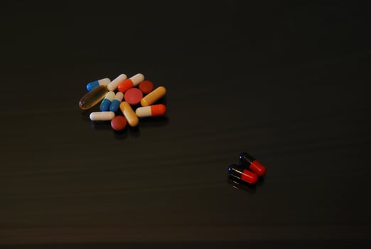 pills on glosy surface photo