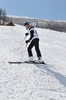 happy skier woman portrait photo