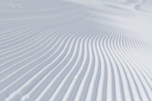 tracks on ski slopes at beautiful sunny  winter day photo