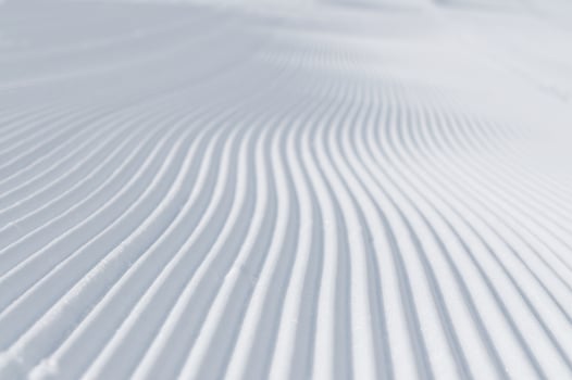tracks on ski slopes at beautiful sunny  winter day photo