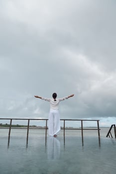 young woman relax on cloudy summer day photo