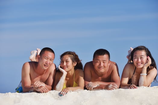 group of happy young people have fun on bach photo