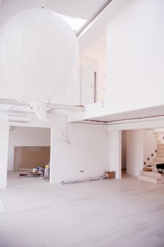 Interior of empty stylish modern open space two level apartment photo