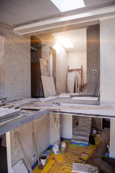 yellow underfloor heating installation with white pipes photo