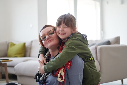 Mother and little girl daughter playing with jewelry  at home photo