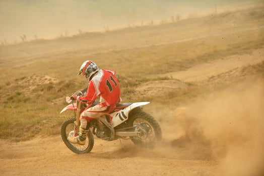 Riding a motocross bike photo