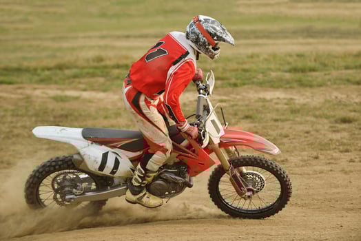 Riding a motocross bike photo