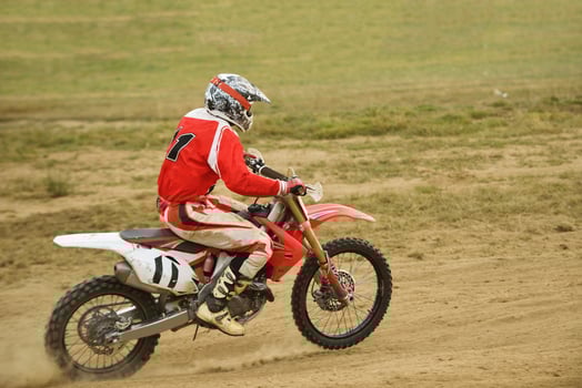 Riding a motocross bike photo