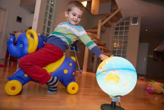 Little boy child playing with creative toys photo