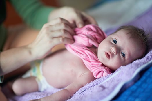 happy newborn little baby smilling photo