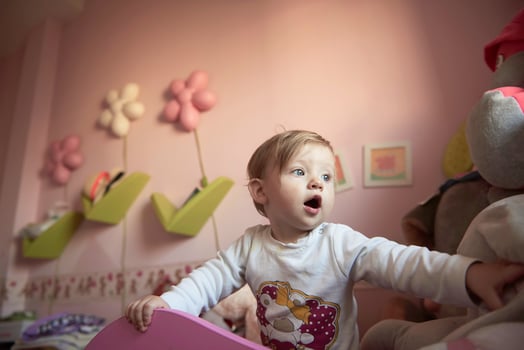 cute  little one year old baby and making first steps photo
