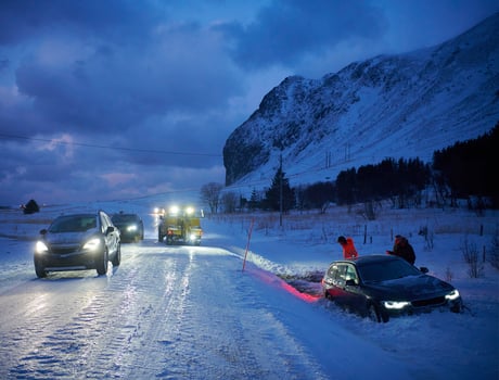 Car being towed after accident in snow storm photo