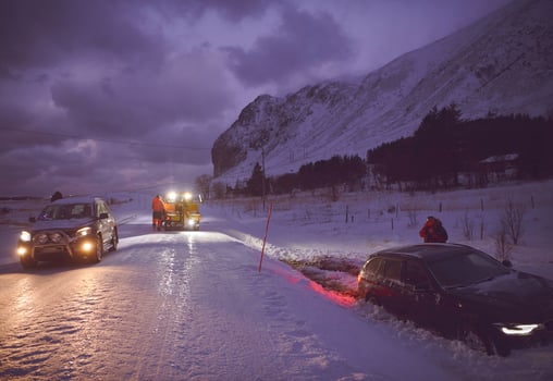Car being towed after accident in snow storm photo