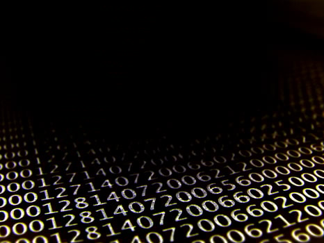 database concept with printed and coded database records photo