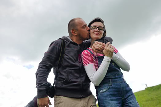 romantic young couple in love together outdoor photo