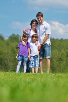 happy young family have fun outdoors photo