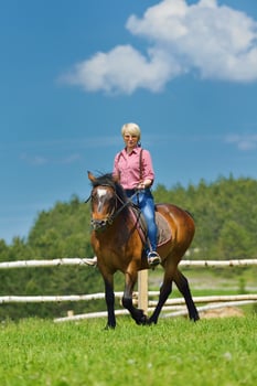 happy woman  ride  horse photo
