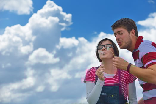 Portrait of romantic young couple smiling together outdoor photo
