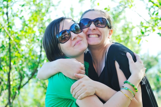 woman pragnant outdoor with friend photo