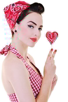 happy woman with lollipop isolated on white photo