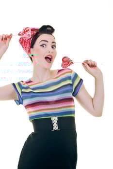 pretty young happy woman with travel bag waiting and posing isol photo