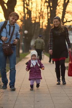 young pregnant couple have fun and relax photo