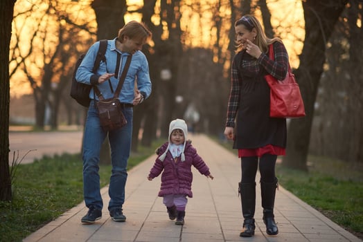 young pregnant couple have fun and relax photo