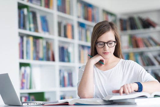 female student study in school library photo