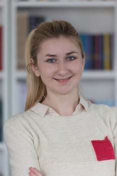 portrait of female student in library photo