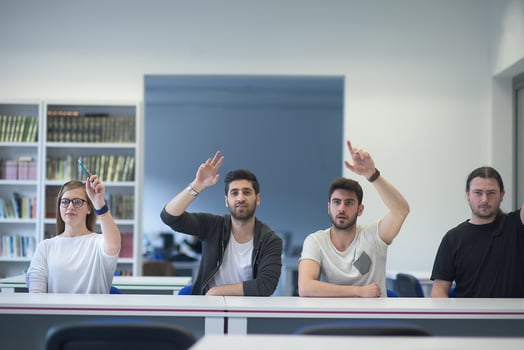 group of students  raise hands up photo