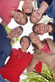 young friends staying together outdoor in the park photo