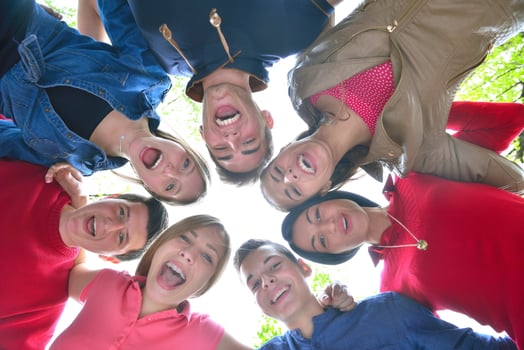 young friends staying together outdoor in the park photo