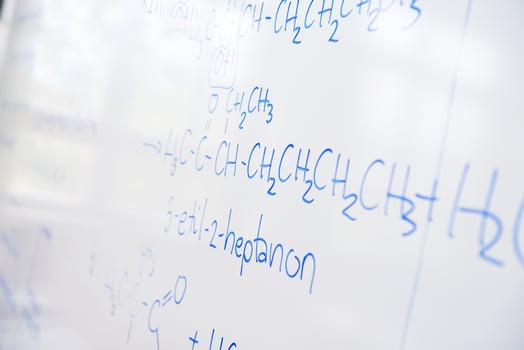 chemical molecule structure on white boar photo