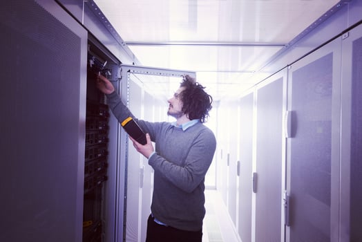 technician using digital cable analyzer photo