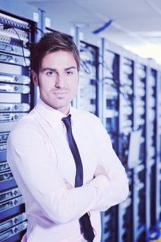 it engineers in network server room photo